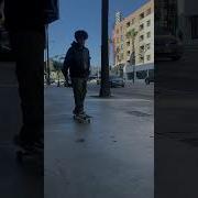 Kid In California Cruising With Bulletproof Vest