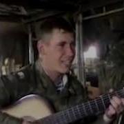 Russian Soldier Sings To The Guitar For What We Drink