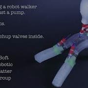 A Fluidic Relaxation Oscillator For Reprogrammable Sequential Actuation In Soft Robots