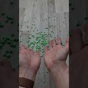 Throwing Green Beads Reverse Video Shorts