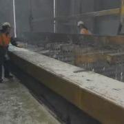 Paddling The Surface Of A Hot Dip Galvanizing Kettle