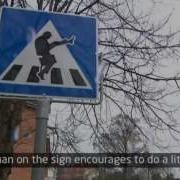 Traffic Sign Makes People Do The Monty Python Silly Walk