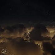Flying Through Clouds Above City Free HD Motion Graphic Seamless Loop Live Wallpaper