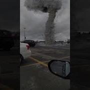 Small Tornado On A Parking Lot