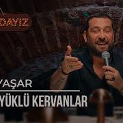 Ümit Yaşar Sevda Yüklü Kervanlar Masadayız