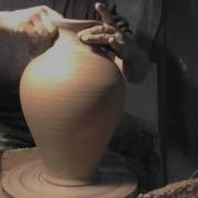 Making Throwing Clay Amphora On The Potter Wheel