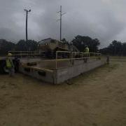 Unloading An LHS From A Flatbed Trailer