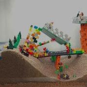 Two Towers Meet Their Fate In Sand Dam Collapse Test