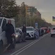 Ukrainians Kneel On Road As Their Fallen Heroes Return Home