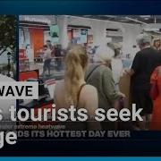Tourists On Champs Élysées Seek Refuge From Heat As More Records Tumble FRANCE 24 English