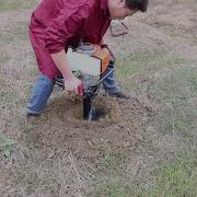 63CC EARTH AUGER WORKING WITH 300MM DRILL BIT