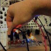 Turing Machine Bytes Expander Under Control Voltage