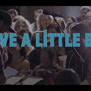 Choir Of 600 Sings Give A Little Bit