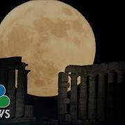 Watch Strawberry Supermoon Rises Over Greek Temple