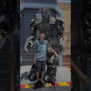Thomas Holding Megatron S Hand Shorts Universalstudios Autism