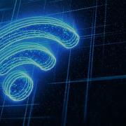 WiFi Internet Symbol Glowing On A Futuristic Technology Background Loop