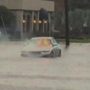 Car Catches Fire On A Flooded Tampa Street