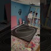 Person Shows The Process Of Making A Large Harmonograph Painting