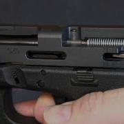 Как работает пистолет Glock с разрезом корпуса Glock