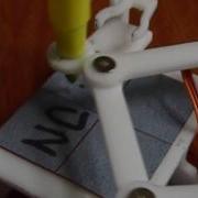 Enhanced Erase Less Arduino Plotclock Used To Write NCUe 彰師大機器人繪製機