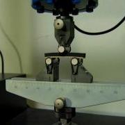 Test Setup Flexural Test Fixture Closeup For Abrasives