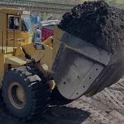 Caterpillar 992C Wheel Loader With Custom Coal Bucket Loading Trucks With One Pass S G M Melidis