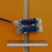 Vacuum Powered Fabric Based Soft Robotic Worm Crossing Gap