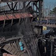 Перекатывающийся уголь Огромный 90 летний док компании Norfolk Southern для перевалки грузов с