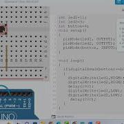 One Push Button Controlling 2 Leds Arduino Projects Tinkercad