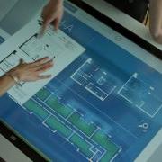 Multitouch Application For Real Estate Agents Presented On An Interactive Table