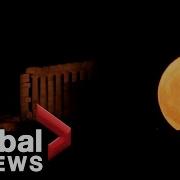 Strawberry Supermoon Rises Behind Ancient Coastal Greek Temple