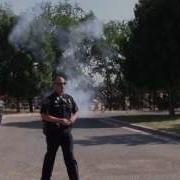 APD SWAT Officer Throws Flash Bang Grenade