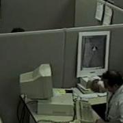 Angry Office IT Employee Breaking His PC With Keyboard In Frustration