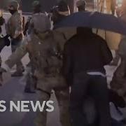 Video Shows ICE Protesters Being Dragged By Agents Near Chicago