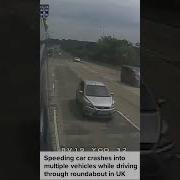 Speeding Car Crashes Into Multiple Vehicles While Driving Through Roundabout In UK