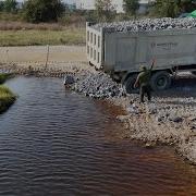 New Landfill Site Formed With Dozer Push Huge Loads From Dump Truck 25Ton Fill In The Corners