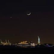 A Time Stack Time Lapse Of The Crescent Moon Setting Over The Statue Of Liberty National Monument