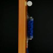 Vacuum Powered Fabric Based Soft Robotic Worm Climbing Vertical Wall