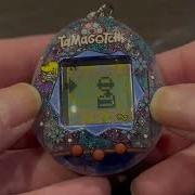 Распаковка и игровой процесс Tamagotchi Winter Stained Glass Gen 2
