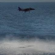 Harrier Jump Jet Performs Vertical Takeoff And Landing On Ship