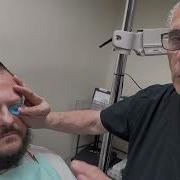 Patient Having A Impression Taken Of The Front Surface Of His Eye
