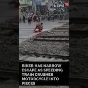 Bike Train Accident News Biker Escapes Deadly Train Accident Shorts CNN News18