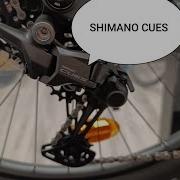 Задний переключатель Shimano CUES в двух словах Система LinkGlide