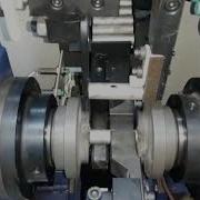 DOUBLE END FACING AND CHAMFERING MACHINE WITH AUTO LOADING
